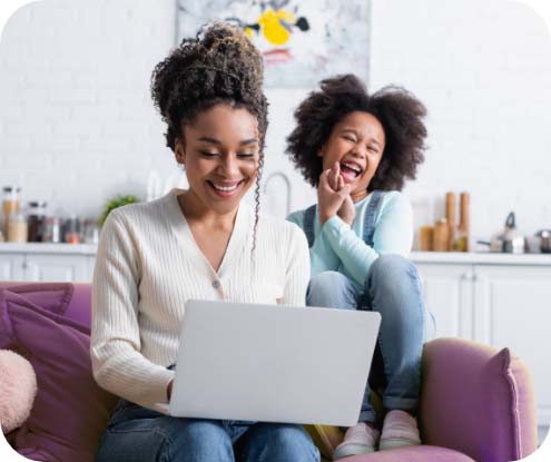 woman and child on laptop