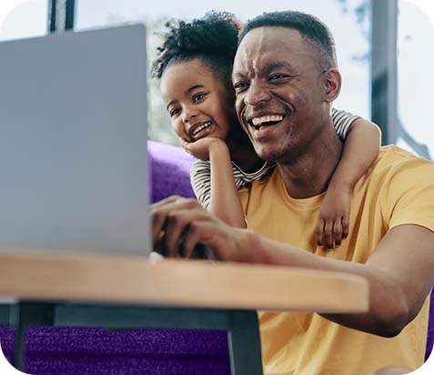 man and girl on laptop