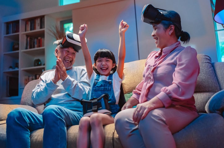 happy family using VR headset