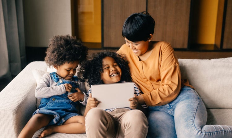 children enjoying tablet entertainment