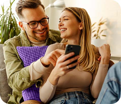 Man and woman looking at phone