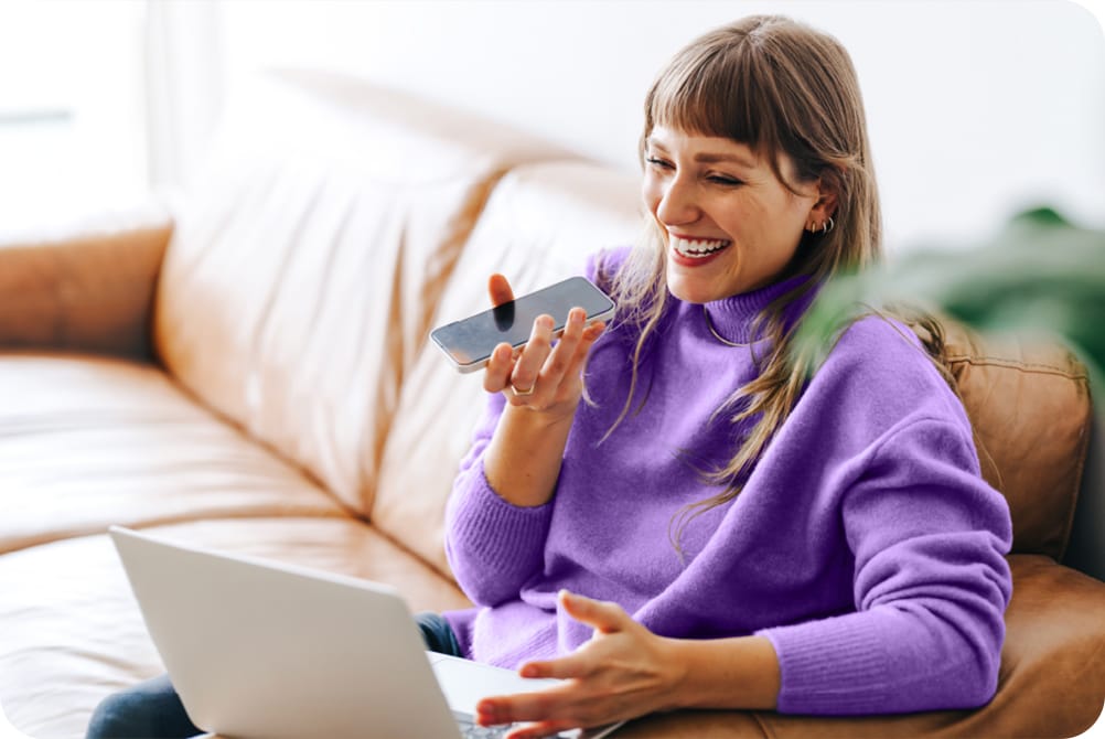 woman laughing talking on phone